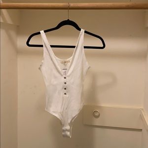 Low cut button up bodysuit